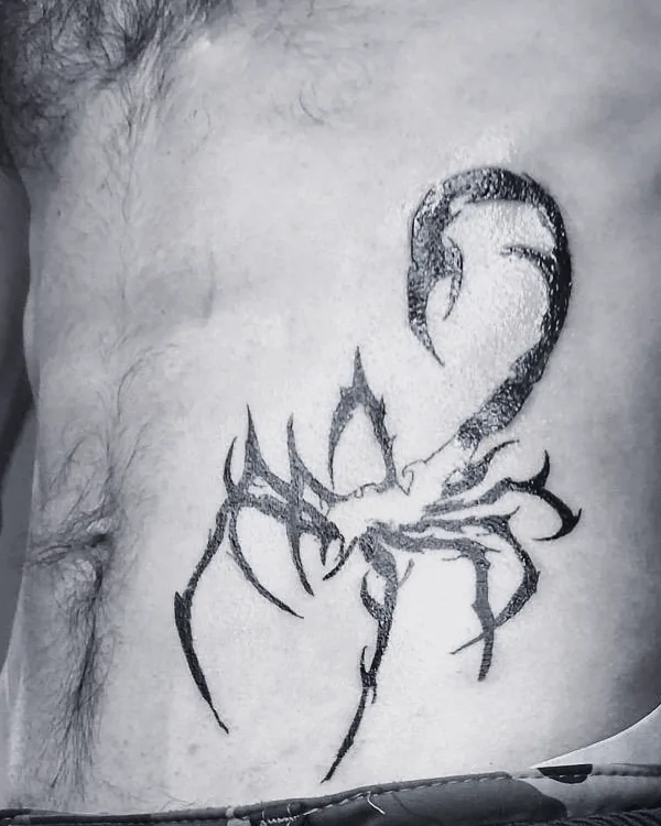 Fine line tattoo by Sami Sami at S.Ink — scorpion, ribs