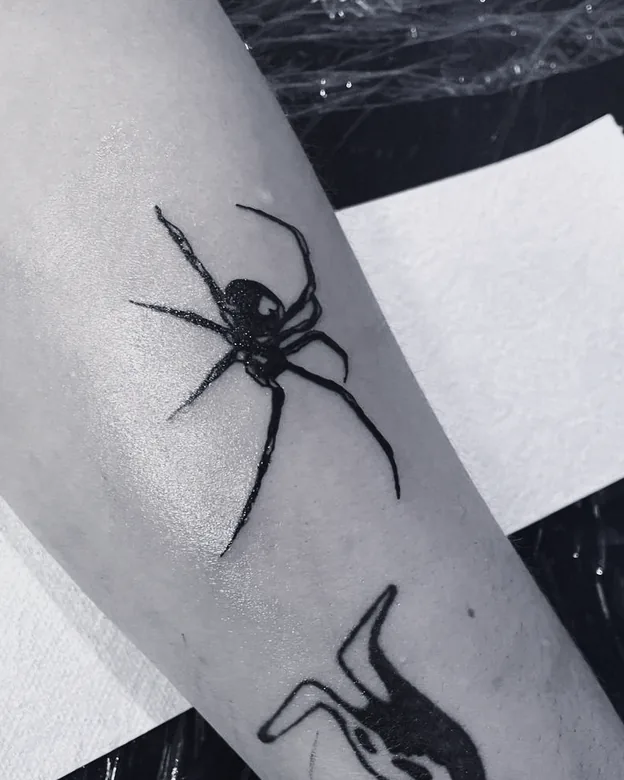 Blackwork tattoo by Sami Sami at S.Ink — widow, forearm